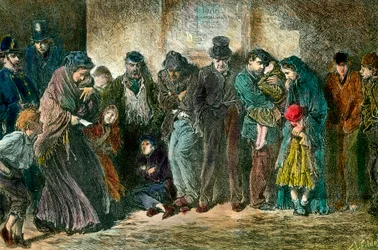 Poverty in London at the Door of a Shelter