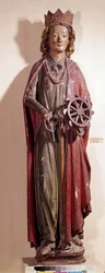 Representation of St. Catherine of Alexandria, holding the wheel instrument of her torment. Polychrome wooden statue
