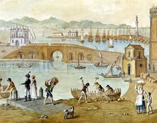 The port of Naples and Santa Lucia around 1800: travellers are preparing to leave and carpenters build a boat. Watercolour.