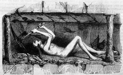 Young man working in the coal mines in England