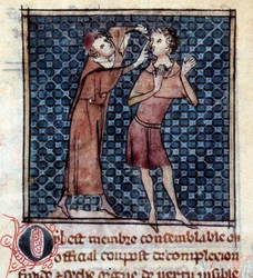 Doctor examining the eye of a patient