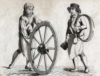 Charron with cart wheel and apprentice. Engraving late 18th century.