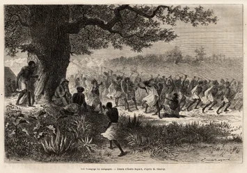 The Vouagogo (tribe of Tanzania) in preparation for war, under the tree, the author of the story Henry Morton Stanley (1841-1904). Engraving to illustrate the voyage in search of Livingstone, in central Africa
