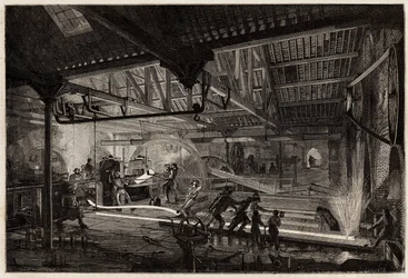 The manufacture of the rails in the old forges of Le Creusot, the steel strips, white of heat, extend in rails between the rolling mills. Engraving to illustrate a voyage to the Creusot and the mines of Saone and Loire, in 1865, by L. Simonin, in 