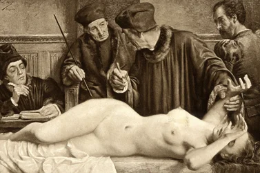 Witchcraft. Scientists are looking for a mole on the body of a witch, in order to pinch it and study the reaction. Illustration by E. Van Hoove. 1888