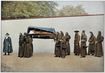 Brothers of a charitable jam carrying a sick person to the hospital, Italy, late 19th century