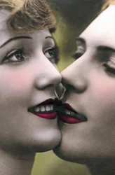 Close-up of Faces of Women Kissing