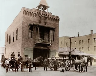 Fire brigade posing outside the barracks, Los Angeles. California, USA. 1887. Photography