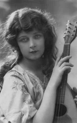 French Postcard of a Beautiful Young Woman with Neapolitan Style Mandolin, circa 1912
