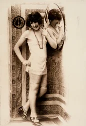 Full-Length Portrait of a Woman in Intimate Apparel