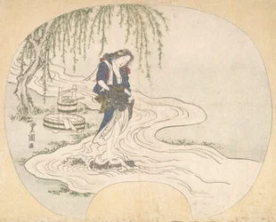 A Woman Stands on a Rock in a Stream Washing Clothes