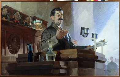 Joseph Stalin (Joseph Vissarionovich Djougachvili) (1879-1953) Redefines the Soviet Constitution (Stalin Constitution) at the 8th Extraordinary Congress of Soviets on December 5, 1936. Viatcheslav Molotov (1890-1986) is Seen on the Right