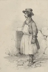 Man wearing an apron and a hat