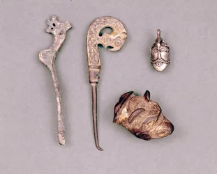 Various pieces of apparatus and Viking jewels, with a representation of the deity Odin. Stockholm, Historiska Museet