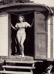 Young woman on a circus carriage