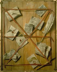 A Board with Attached Letters