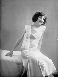 Model wearing a dress created by Anita Pittoni, c.1940