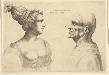 A Female with Hair Tied Back and a Bald Male Facing Each Other