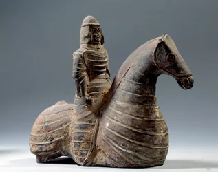 Chinese Art: Statuette of Horseman in Armor (206 BC-220 AD), Han Period. Paris, Musee Cernuschi