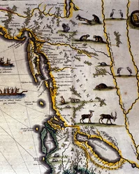 Geographic map of the 17th century Dutch Atlas by Wilhelm Blaeu showing American and Canadian territories fur animal peoples. The North is below according to medieval custom.
