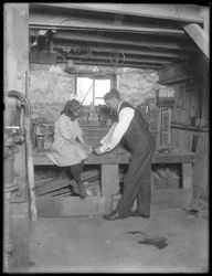 Frank P. Hassler and Mary Hassler in the Basement, Glen Ellyn