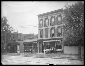 Seven Children Pose in Front of an Unidentified Branch of the Queens Borough Public Library, New York, c.1910