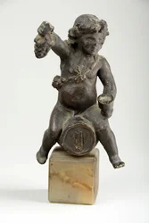 Cherub on a Wine Cask