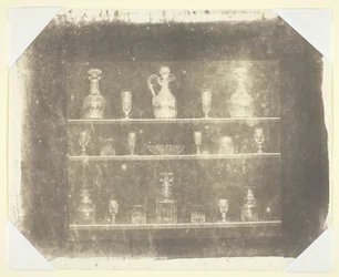 Articles of Glass on Three Shelves