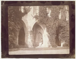 Reverend Calvert Jones seated in the Cloisters, Laycock Abbey