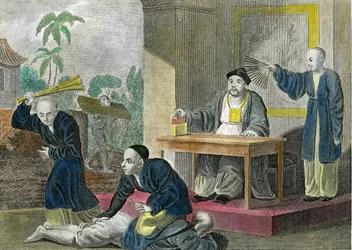A Mandarin Administering Justice