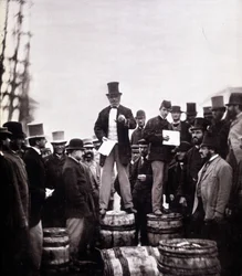 Scene of political discourse on the street: the man stands on a barrel and speaks to an exclusively male crowd. Photograph by William Notman (1826-1891), Musee McCord Museum, Montreal. End of the 19th century