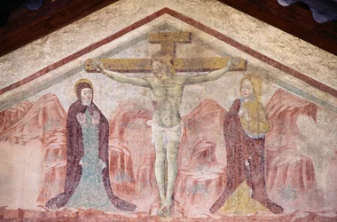 Fresco with Crucifixion in tympanum of Church of St Anthony, Romeno, Italy