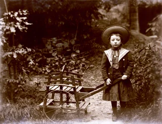 Girl with Cart in a Garden, Early Twentieth Century