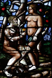 Milan Cathedral. Stained glass window. Adam and Eve. Garden of Eden. Italy