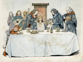 A Little Girl Wearing a Crown Sitting on a Throne at a Banquet Table